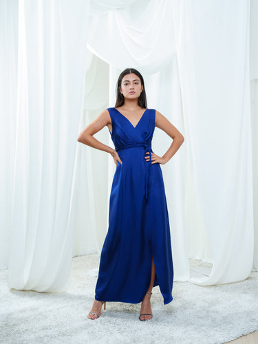 The Center Dress in navy, a silk wrap maxi dress with a surplice V neckline and a tied waist.