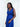 Side view of the Center Dress in navy, showing the silk falling long from the seamed waist.