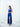 Side view of the Center Dress in navy, showing the silk falling long from the seamed waist.