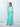 The Dusk Halter and Dusk Skirt in turquoise worn as a set, a full-length silk column in matching turquoise twill.