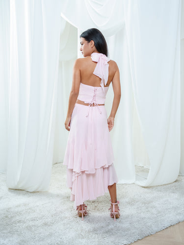 Back view of the Float Skirt and Solana Halter in light pink.