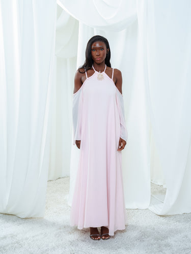 The Vesper Dress in light pink, a silk georgette maxi dress with braided straps and open shoulders.