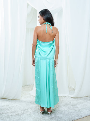 Back view of the Dusk Halter in turquoise, open across the back above the Dusk Skirt.