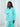 Exhale Blouse in turquoise, front view, relaxed shoulder and open collar with full-length sleeves, pj set in turquoise